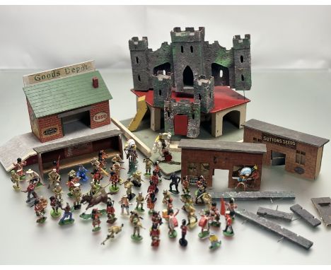 A Vintage wooden fort with collection of plastic Cowboys, Native Americans, Scotts Guards, etc (A lot)