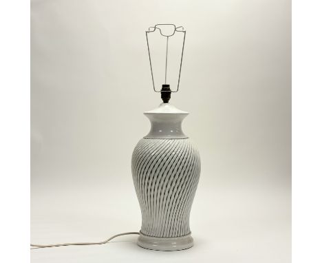 A white glazed lattice cut baluster shaped table lamp (h-58cm)