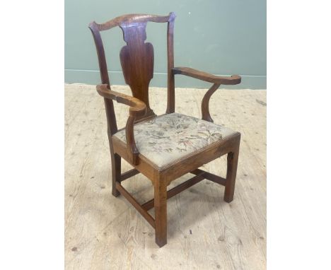 A Georgian elm country splat back chair with tapestry slip in seat and scroll arms, on square supports, shows nice signs of a