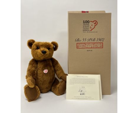 A Steiff 55 PB 1902 replica teddy bear, rust mohair with moulded sealing wax nose, chest tag and certificate with box (h. sta