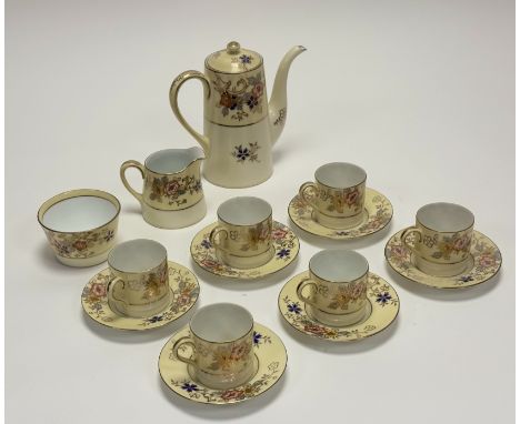 A Noritake cream/white with gilt floral decoration espresso service comprising, six espresso cans (h-6cm), six saucers, a cof