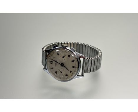 A vintage Ernest Borel Nauchtel stainless steel manual wind chronograph with silvered dial stamped verso 704018 15692 working