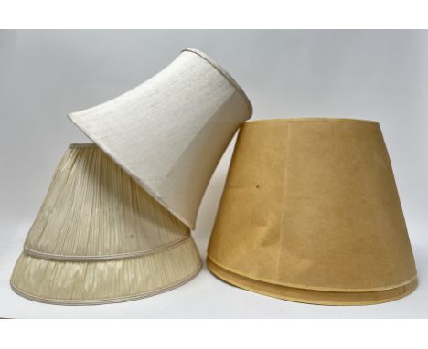 A collection of five lamp shades comprising, a pair of cream pleated silk shades with embroidered borders (h. 26cm and h. 23c