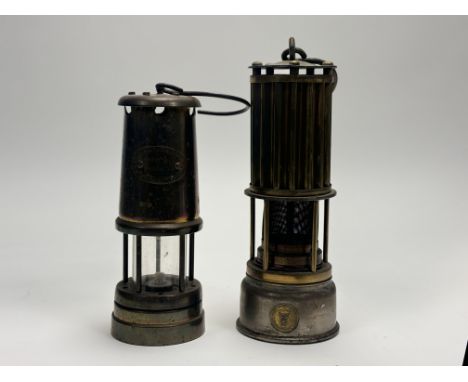 A Hockley Lamp &amp; Limelight Company brass miner's Lamp (h-23cm) together with a Premier Lamp &amp; Engineering Co Ltd Leed