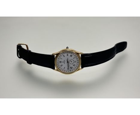 A 18ct gold cased Concord quartz wristwatch with white enamel dial and roman numerals with subsidiaries dial complication on 