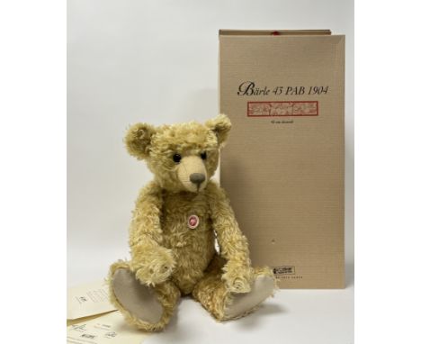 A Steiff limited edition 'Baerle 43 PAB 1904' replica teddy bear for the year 2004, with elephant button to ear and label to 