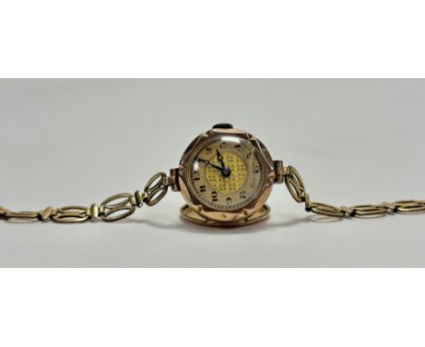 A Vintage 9ct gold ladys wristwatch with gilt dial and arabic numerals on gold plated bracelet a/f: d. x 1.5cm 11.9g 