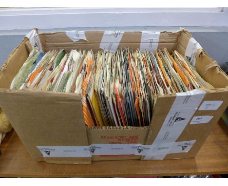 A collection of approximately 100 1960's 7" singles including Bob Dylan, The Beatles, Rolling Stones, etc. 