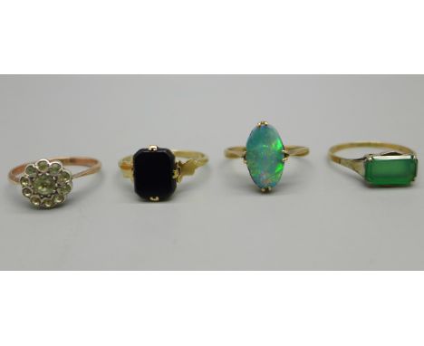 Two 9ct gold rings, opal a/f and dark stone, 3.5g, a 9ct gold and silver cluster ring, 2g, and a yellow metal and green stone