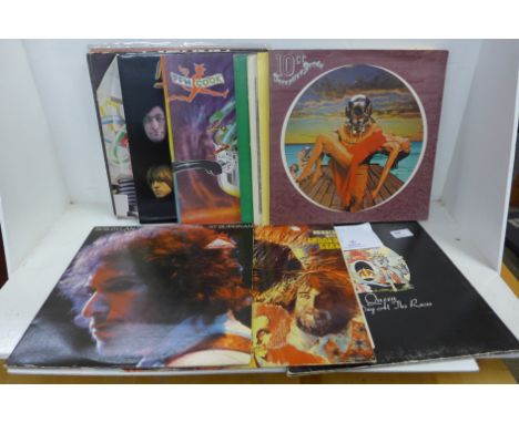 Fifteen assorted rock LP records including Bob Dylan, Queen, Rolling Stones, Canned Heat, etc. 