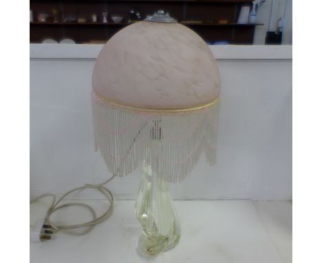 An Art Deco glass lamp base and shade with beaded fringe 