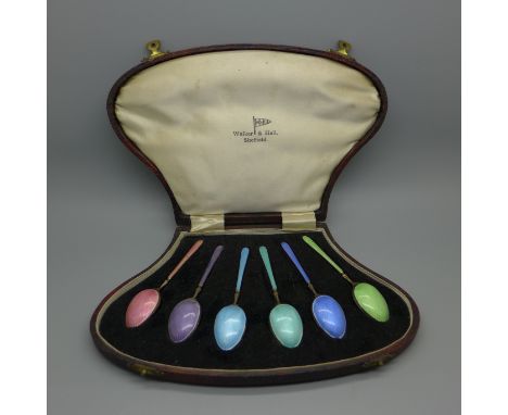 A cased set of six silver gilt and coloured enamel coffee spoons, Walker &amp; Hall, green enamel a/f 