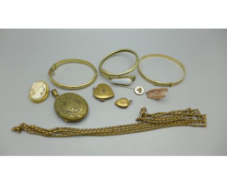 A plated snake bangle set with rose cut diamond eyes and opal, two rolled gold bangles, a plated guard chain and other jewell