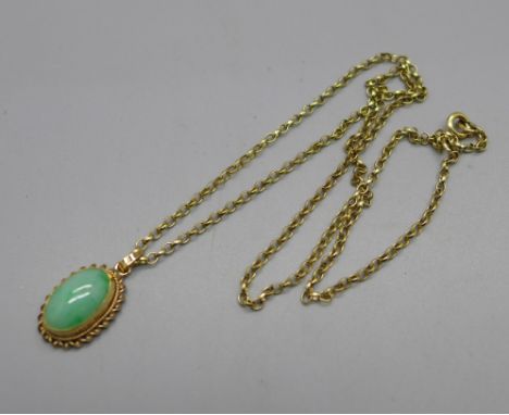 A 9ct gold and jade pendant on a 9ct gold chain, 3.6g 
