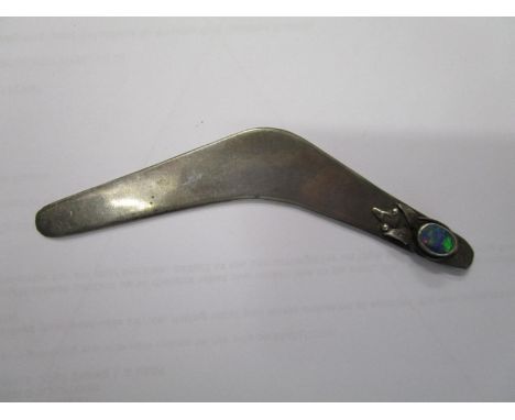 A Prouds (Australian) silver and opal set letter opener in the form of a boomerang, set with a single opal to one end, on top