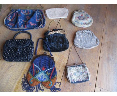 An early 20th century French fine beadwork evening bag, an early 20th century English fabric and silk embroidered evening bag