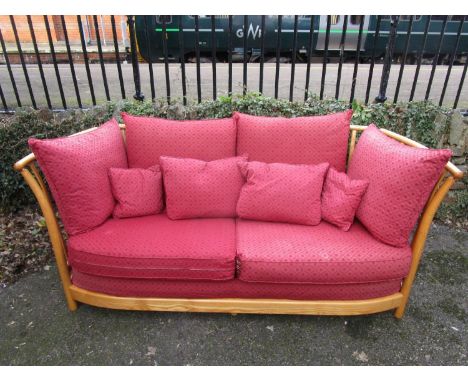 An Ercol Renaissance low back, three seater sofa with loose cushions, circa 2000, Ercol label to one side, 33" h approx, 76" 