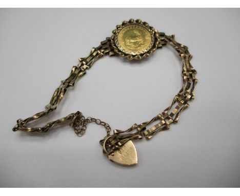 A 9ct gold gate link bracelet set with a 1/10 Krugerrand, 8.8g total weight 