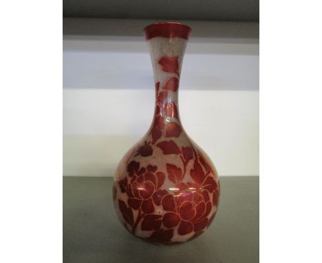 Salopian Art Pottery Company, an Arts &amp; Crafts ruby lustre vase circa 1880, of globular form with a long, narrow and wast