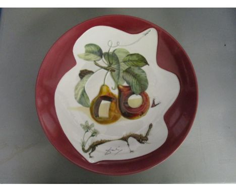 Salvador Dali 1904-1989 - for Royal Limoges, Fruits toues et rhinoceros, a limited edition large plate no 303/1000 of which o