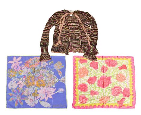 Zandra Rhodes Silk Scarf, decorated with large flower heads amongst greenery, within a bright pink and lime green border, box