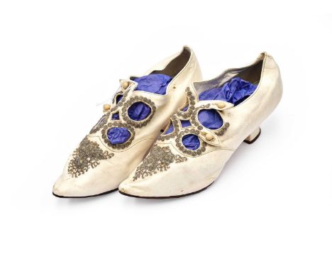 Pair of Late 19th Century White Kid Leather Heeled Shoes, with cut work decoration to the front and two button fastenings to 