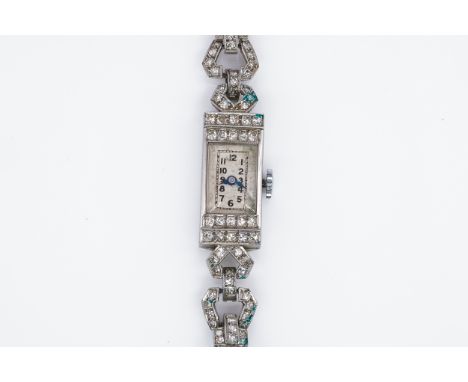 A LADY'S PLATINUM AND DIAMOND SET RECTANGULAR CASED DRESS WRISTWATCHWith a jewelled Swiss rectangular movement, the silvered 