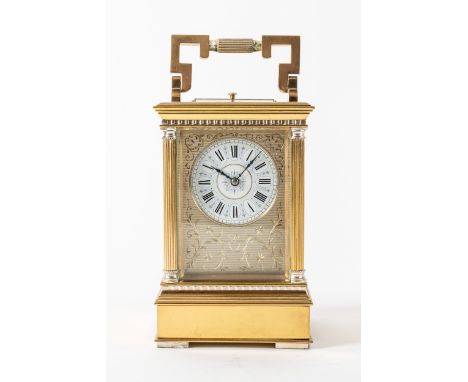 A very rare French gilt striking carriage clock and musical