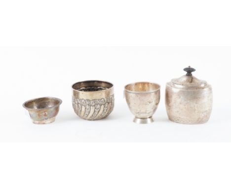 A SILVER TEA CADDY AND THREE FURTHER ITEMS (4)The oval caddy, Sheffield 1884, a bowl with spiral fluted decoration, London 18