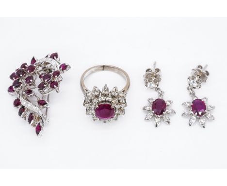 A GROUP OF THREE ITEMS OF RUBY AND DIAMOND JEWELLERY (3)Comprising; a brooch designed as a spray, claw set with circular cut 