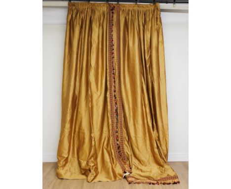 TWO YELLOW GOLD AND TASSEL CURTAINS (2)20th Century Mixed materials including some cotton and silk, with yellow gold and cran