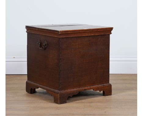 AN 18TH CENTURY AND LATER OAK BOX COMMODEWith lift top moulded edge 44cm wide; 42cm deep; 47cm high