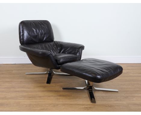 MINOTTI; AN ITALIAN CHROME AND LEATHER LOW ARMCHAIR (2)93cm wide; 89cm high and a matching footstool 62cm wide; 33cm highNo m