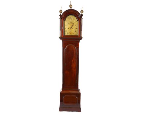 A GEORGE III MAHOGANY LONGCASE CLOCKBy John Jackson, LondonThe case with an arched hood and three brass finials, above glazed