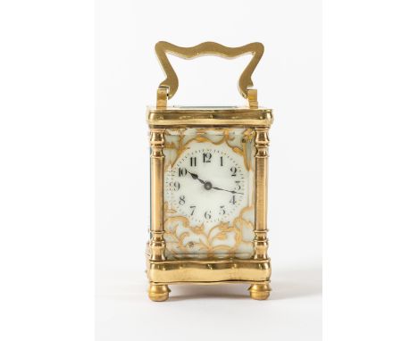 A FRENCH BRASS MINIATURE CARRIAGE TIMEPIECEProbably by Couaillet, Saint Nicholas-d’Aliermont, circa 1900Of serpentine outline
