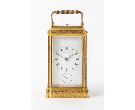 A FRENCH ENGRAVED GILT BRASS GORGE CASED STRIKING AND REPEATING CARRIAGE CLOCKBy H. L. No. 5521, For Parkinson & Frodsham, No