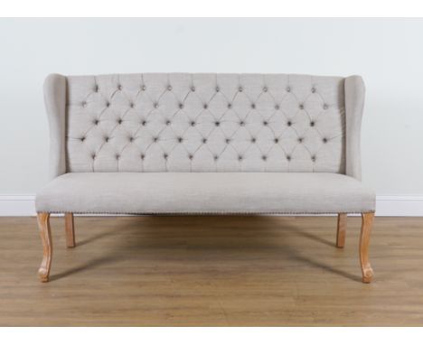 A MODERN GREY BUTTONBACK UPHOLSTERED WING BACK SOFA174cm wide; 104cm high