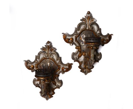 A PAIR OF ITALIAN BAROQUE STYLE SILVERED AND GILT WOOD SINGLE LIGHT WALL SCONCES (2)Late 19th Century  Each cartouche shaped 