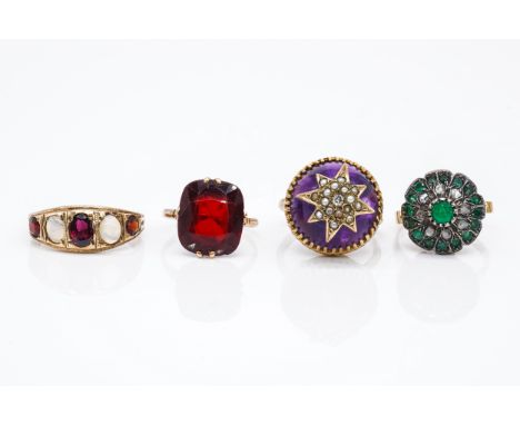 FOUR RINGS (4)Comprising; a diamond, seed pearl and cabochon amethyst ring, detailed 9 CT, ring size M, a 9ct gold, garnet an