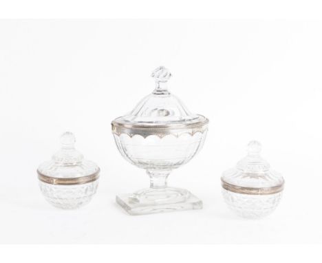 A GROUP OF SILVER MOUNTED TABLE CUT GLASSWARE (3)Comprising; a lidded sauce tureen of Adam form, raised on a rectangular foot