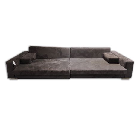 A BROWN SUEDE UPHOLSTERED FOUR SEAT SOFA310cm wide; 70cm high