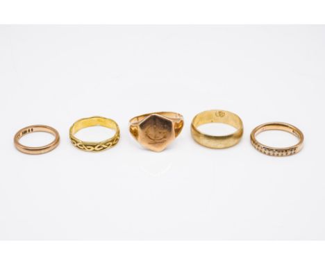 FIVE GOLD RINGS (5)Comprising; an 18ct gold ring with Celtic decoration, ring size M and a half, weight 2.8 gms, a 9ct gold a