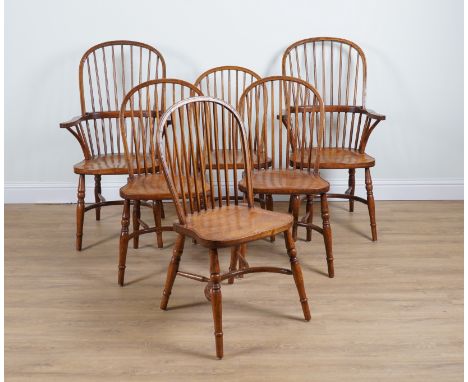 A SET OF SIX ASH AND ELM STICK BACK DINING CHAIRS (6)To include two carver chairs 60cm wide; 120cm highGood overall condition