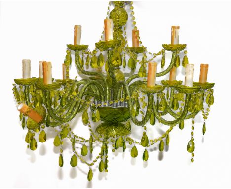 A VENETIAN LIME GREEN GLASS FOURTEEN LIGHT CHANDELIERLate 20th Century  With scroll arms issuing from a chrome plated central