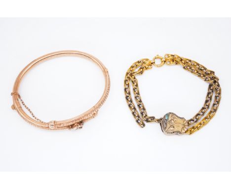 A GOLD AND DIAMOND BRACELET AND A GOLD OVAL HINGED BANGLE (2)The bead and twin curb link bracelet, with a rose diamond set sl