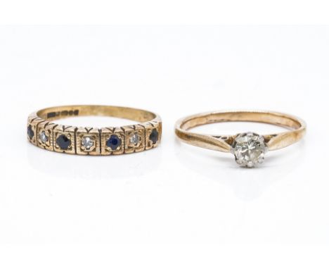 A DIAMOND SOLITAIRE RING AND A GEMSET BAND (2)The solitaire claw set, in unmarked gold, ring size M 1/2, weight 2 grams, with