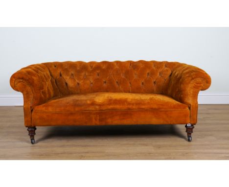 A 19TH CENTURY AND LATER TAN SUEDE UPHOLSTERED TWO SEAT CHESTERFIELD SOFAOn turn supports 180cm wide; 63cm highUpholstery is 