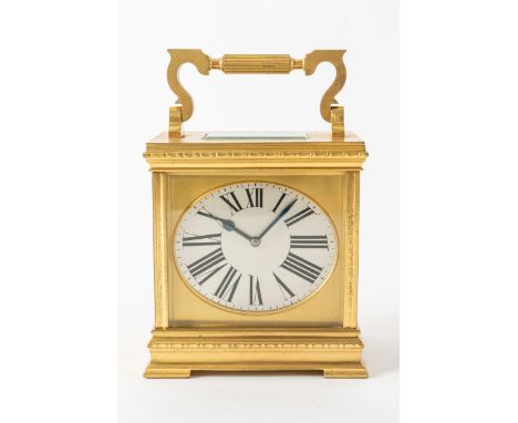 A FRENCH GILT-BRASS CARRIAGE CLOCK WITH ELLIPTICAL DIALBy Couaillet, Saint Nicholas-d’Aliermont, No 1571, circa 1910The squat