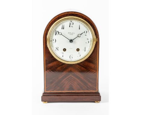 AN EDWARDIAN MAHOGANY AND LINE INLAID LIBRARY CLOCKThe dial detailed Payne & Co, 163 New Bond Street, London / ParisThe arche