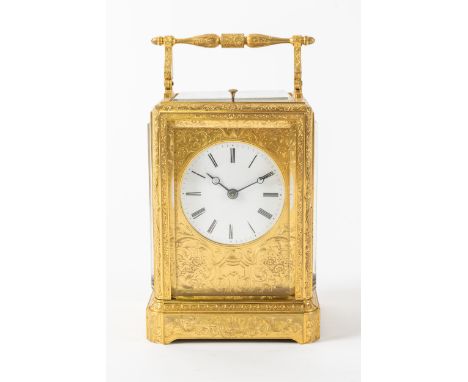 A FRENCH ENGRAVED, GILT BRASS ONE-PIECE CASE, STRIKING AND REPEATING CARRIAGE CLOCKRetailed by Barwise, London, circa 1865The